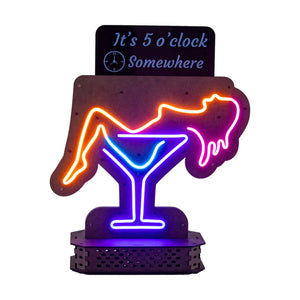 A litten up Neon Lady lying in a margarita glass from Scotch & Sofa.